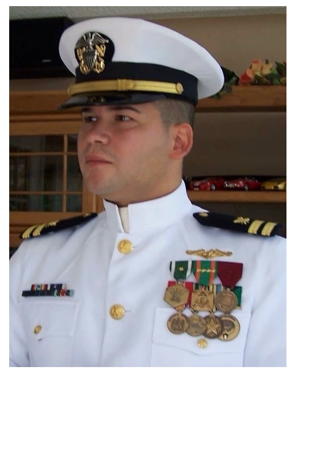 Jorge Malavet in Navy dress whites